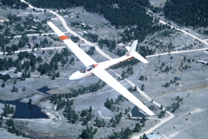 Aircraft #11 - Schweizer SGS 2-32 N2421W, first flown 2 May 1976 from the former Black Forest, CO gliderport. Pictured is sister ship N2477W over Black Forest.