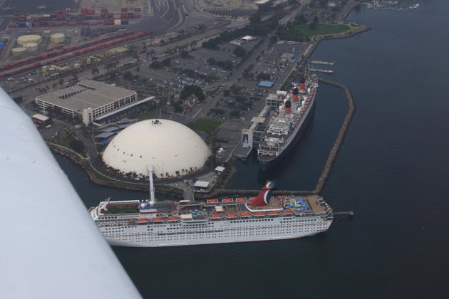 The Queen Mary and a cruise ship in view as Alex, David and I flew over the Long Beach Harbor. Photo by David Kasprzyk.