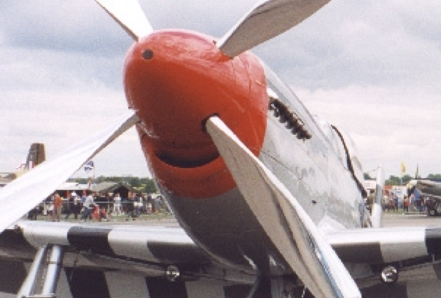 P-51 Mustang at the North Weald airshow, Spitfire and Hurricane in the background.