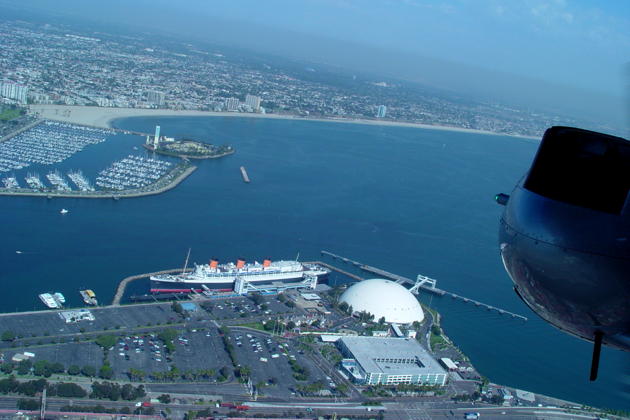 The Queen Mary and Long Beach harbor looking aft from the Goodyear blimp.