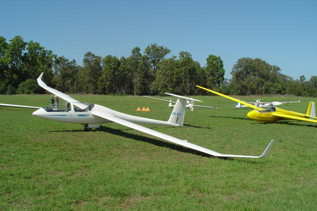 Southern Cross Gliding Club's DG-1000 VH-DGI at Camden airfield, along with the club's brilliantly painted ASK-13.