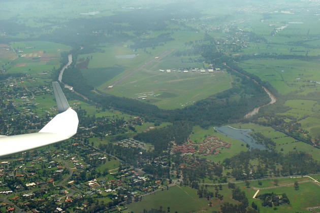 Another view of Camden airfield and the DG-1000 wingtip, with ocean haze still visible at the top of the photo, toward Sydney.