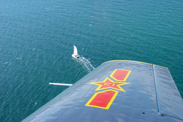 Flying over a catamaran just off the coast of Adelaide, South Australia looking down the Nanchang wing.
