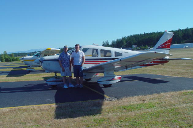 With David and our Warrior II at the Friday Harbor airport. Photo by Mary Kasprzyk.