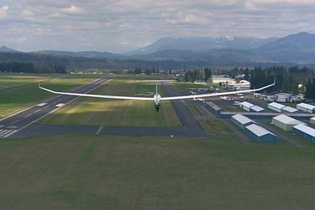 Unique view of the DG-1000 on final at Arlington. Video still from the KING 5 helicopter.