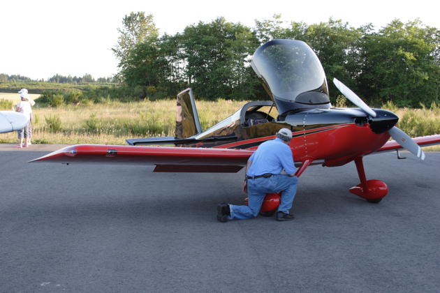 Greg Williams pre-flighting his RV-7.