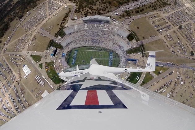 Lt. Col. Noel 'Hank' Williams glides over the U.S. Air Force Academy football stadium during his December 2017 fini flight in a TG-16. Hank was one of my initial DG-1001 transition students at Edwards AFB in 2011. USAF Photo.