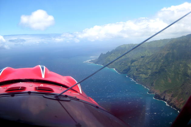 Northeast-bound over the WACO's nose on Kauai's Na Pali coast.