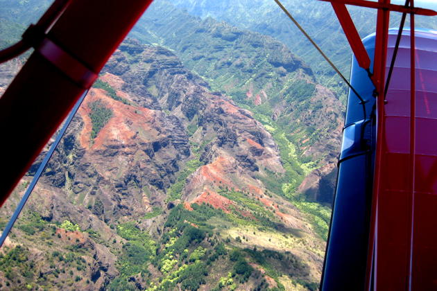 Overflying the multi-colored hills approaching Kauai's Waimea Canyon.