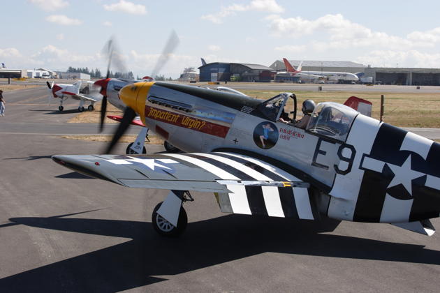 P-51s 'Impatient Virgin' and 'Val Halla' running up besides our 4-ship at Paine Field.