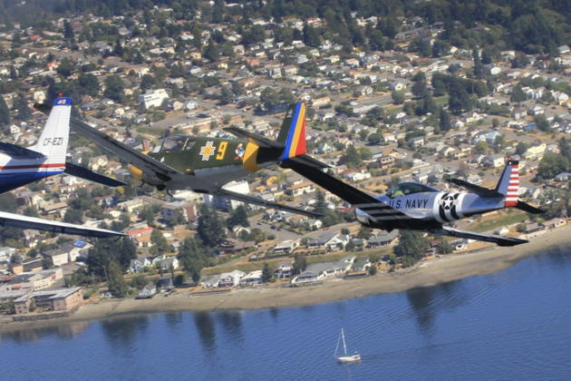 Flying in Dave Desmon's Navion leading Bob Hill's IAR-823 and Ray Roussy's Navion over Bremerton. Photo by Al Sauer.