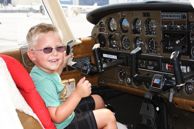 Alex after our Long Beach flight, ready in the pilot's seat!