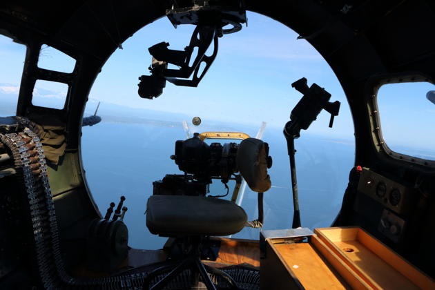 A view out the front of the B-17, from the bombardier and front gunner's position, with the Puget Sound ahead.