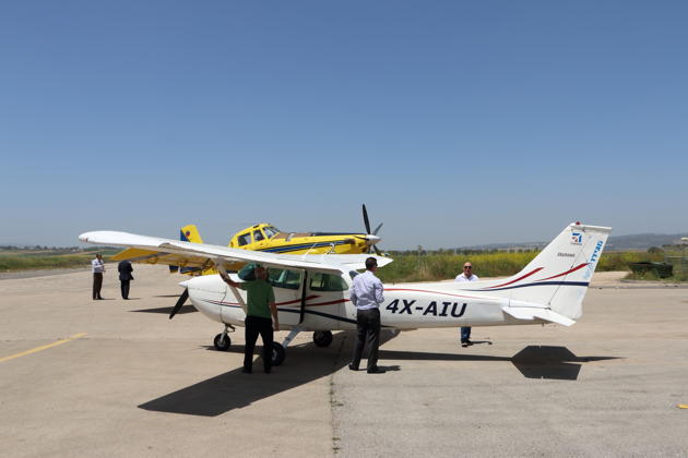 Prepping for our flight from Megiddo airfield in Israel, with a fire-fighting aircraft also ready to fly.