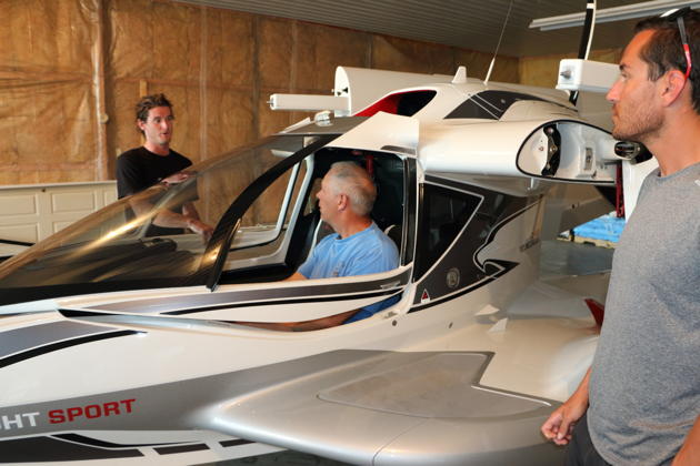 Checking out the cockpit of the first production Icon A-5. Photo by Neil Morrison.