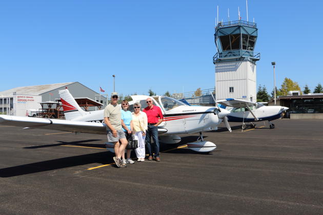 At Tacoma Narrows airport with Dick and Connie Vaughan. Photo by our HUB waitress, Lauren Vangel.