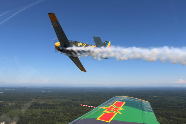 Bob Hill's IAR-823, with smoke on, in the break for landing at Bremerton. View from Larry 'Spooky' Pine's Nanchang CJ-6.