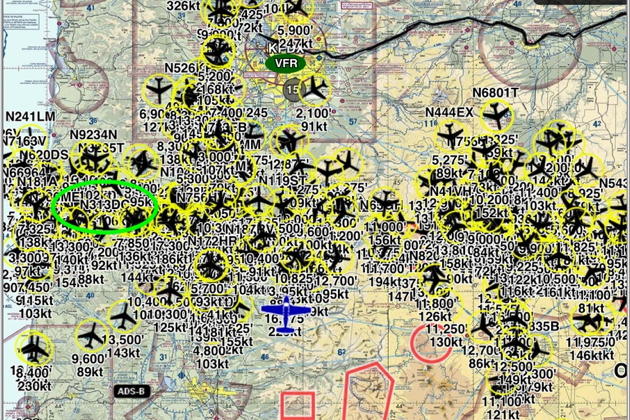 A view from Chuck Newman in his RV-8, N828RV, with our Warrior, N313DC (circled in light green) showing clearly in the giant traffic gaggle!