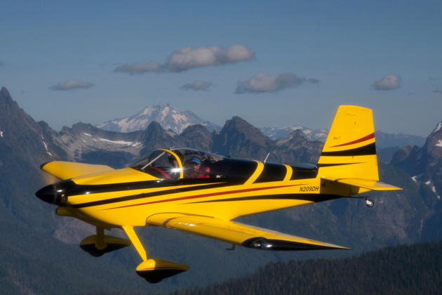 Joining in close formation, with the Cascade Mountains to the east. Photo by John Clark.