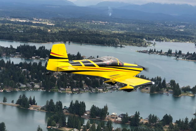 Doug and Anne Happe in their RV-7 over Lake Tapps. Photo by Mary Kasprzyk.