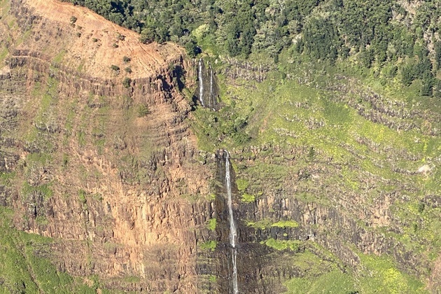 Overflying Waipo'o Falls in Kauai's Waimea Canyon.