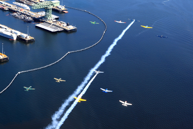 All eleven warbirds of Victory Flight over the Port of Bremerton. Photo by Dave Richardson.