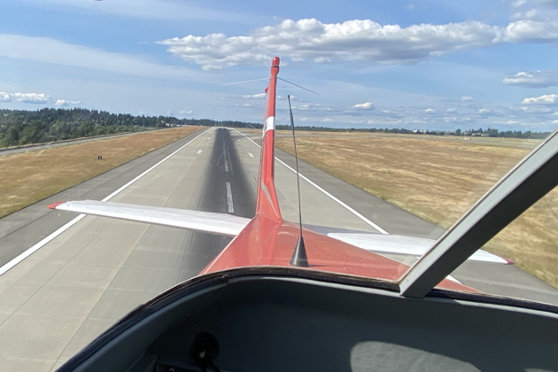 Looking aft in the Cessna 150 after our first touch and go on runway 16R at SeaTac. Photo by Chris Marshall.