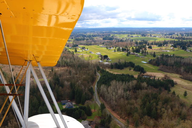 Evergreen Sky Ranch airport behind our upper wing after takeoff.