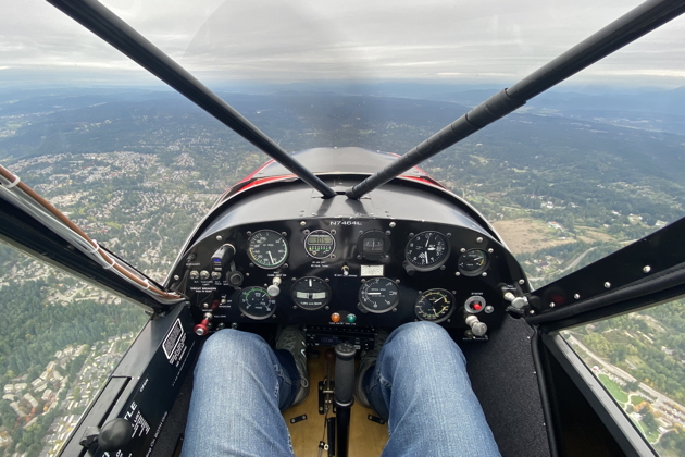 The Super Cub cockpit once leveled from our impressive climb.