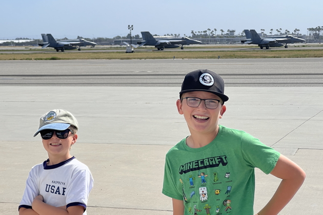 The boys are ready to start pre-flighting 3DC at the Long Beach airport, with some F/A-18E visitors. Photo by David Kasprzyk.