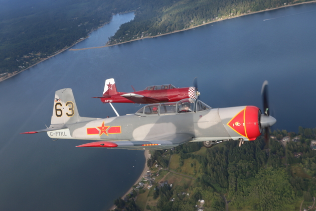 Chris 'Lights Out' Walker and Brian Youmans in their Nanchang CJ-6s.