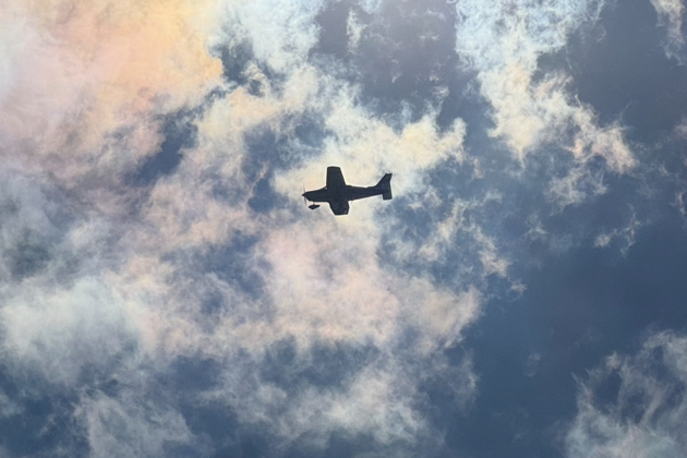 Alex flying over our neighborhood in 3DC. Photo by David Kasprzyk.