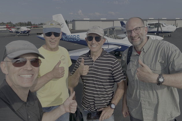 All smiles after a day of RV-12 formation flying, with Troy 'T-Lar' Larson, Stan 'Sundance' Kasprzyk, Greg Gohsman and Tom Sanderson. Troy Larson photo.