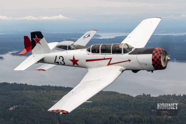 Flying with Tom 'Chox' Spreen in his Nanchang C-FXMI with Eric Johnson in his Navion on our wing. Photo by Brodie 'Chokin' Winkler.