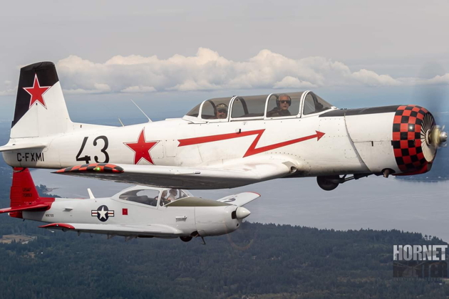 Flying with Tom 'Chox' Spreen in his Nanchang C-FXMI with Eric Johnson in his Navion  on our wing. Photo by Brodie 'Chokin' Winkler.