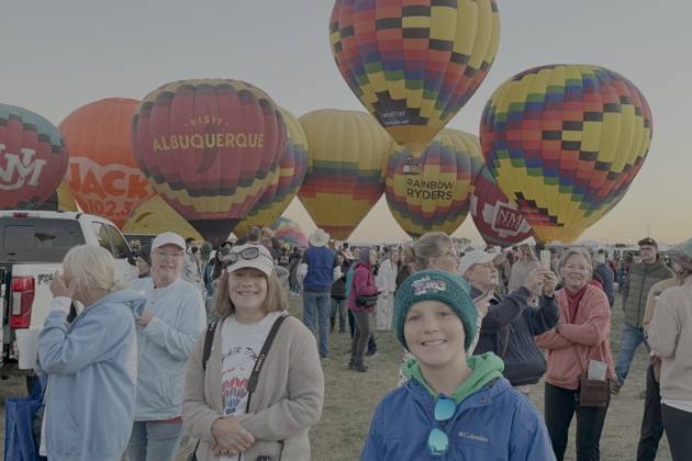 Ma and Nathaniel getting ready to crew at Balloon Fiesta Park. My photo.