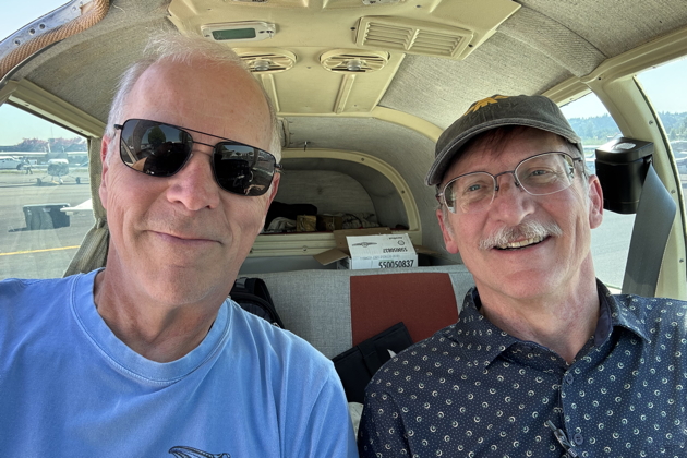 Post-flight smiles with Bob Hardin in his Mooney M20E. My photo.