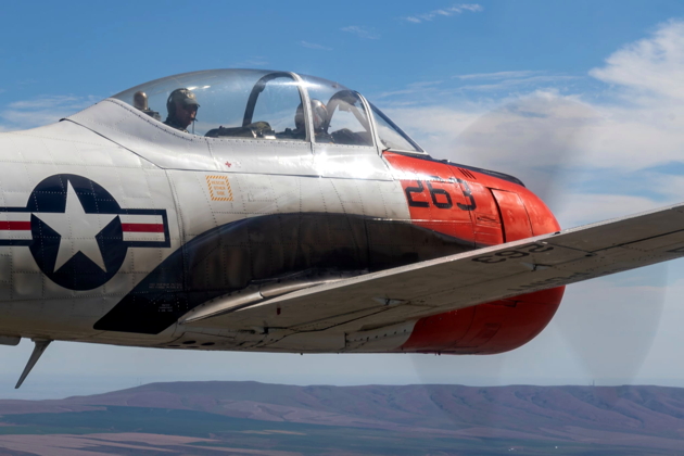 Looking back for wingman alignment in Scott Urban's T-28B N63NA. Photo by Brodie 'Chokin' Winkler.