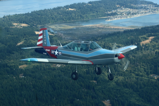 Close formtion with Trent Hendricks in his Kachina during his formation check flight. Photo by Bob Stoney.