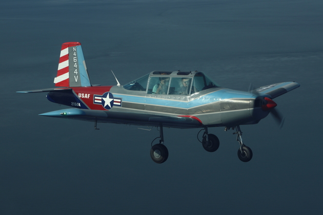 Close formtion with Trent Hendricks in his Kachina during his formation check flight. Photo by Bob Stoney.