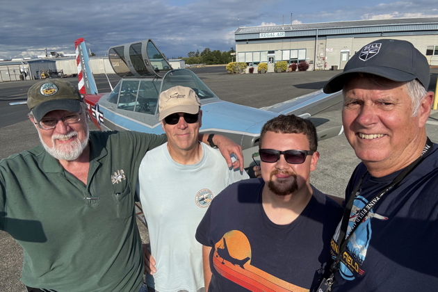 Dave 'Prancer' Desmon, Stan 'Sundance' Kasprzyk, Trent Hendricks and Bob Stoney after Trent's successful formation check flight. Photo by Bob Stoney.