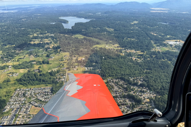 A nice view of Lake Youngs and my home neighborhood while climbing out in the Sling TSi. My photo.