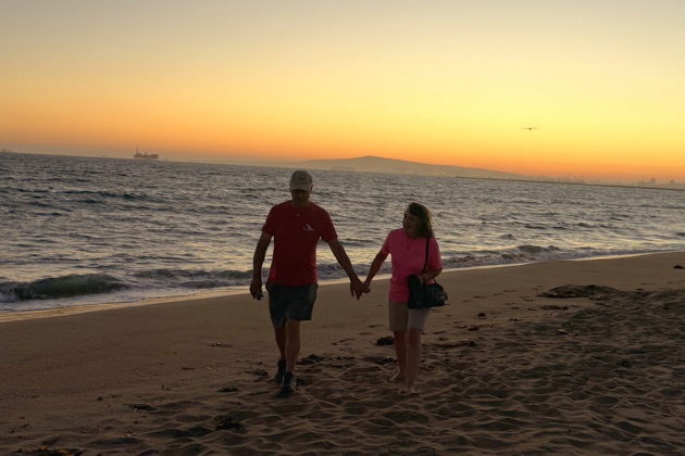 Enjoying an evening stroll on Sunset Beach. Photo by David Kasprzyk.