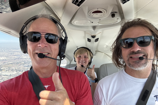 David and Nathaniel cruising with me in 3DC out of Long Beach, CA. My photo.