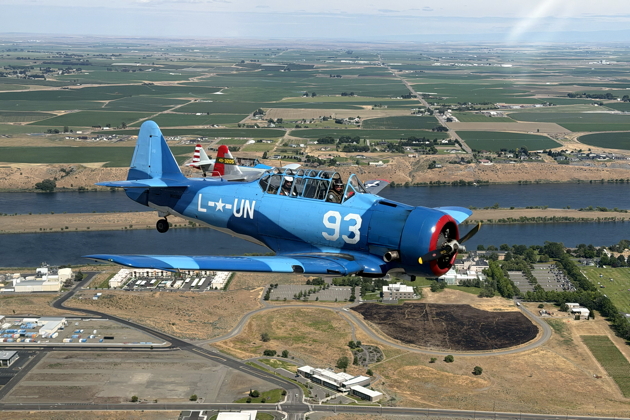 Jay Pemberton, Chris LaFave and John Walborn on the wing from Ben 'Evil' Cook's SNJ-4, N6427D. My photo.