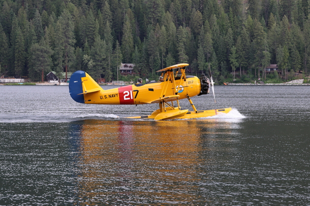 Addison Pemberton giving the next flight orientation in the N3N.