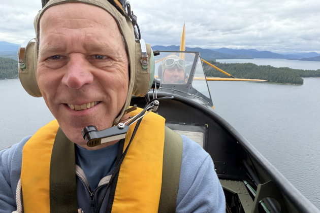 Enjoying the open cockpit in the N3N on floats.